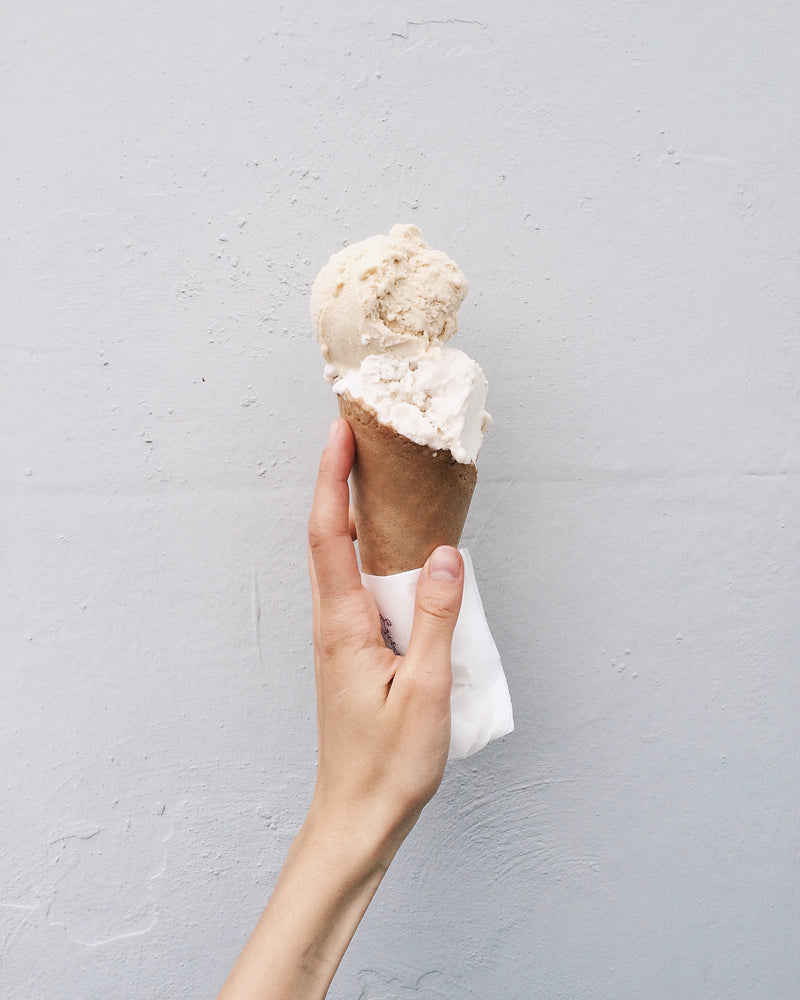 White soft serve ice cream cone